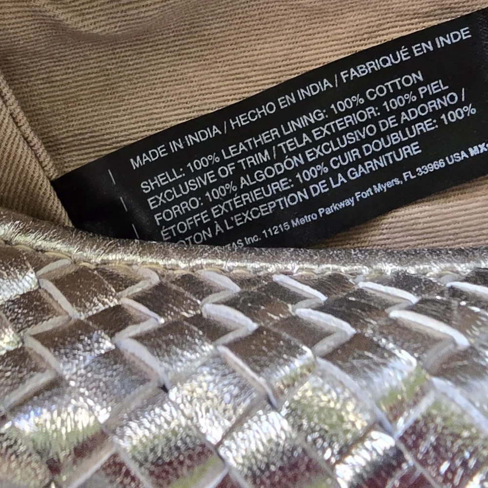 EUC WHBM Luxurious Silver Genuine Leather Woven Knot Bag
